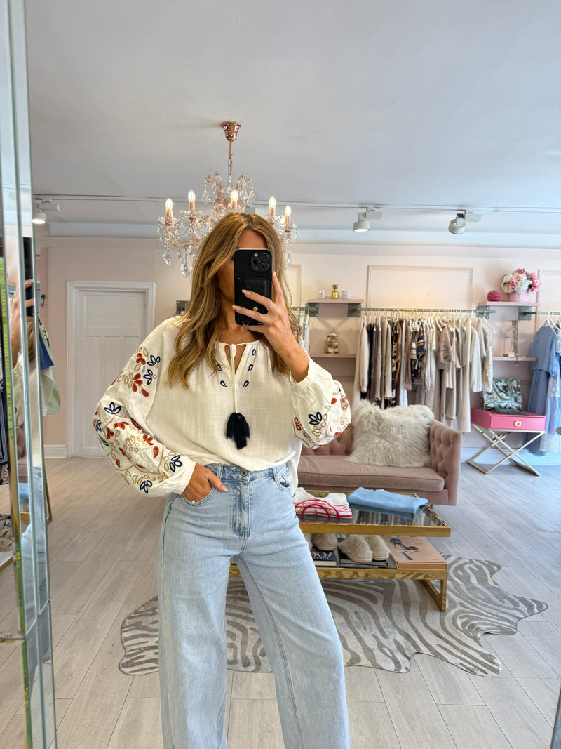 MAURA EMBROIDERED TASSLE BLOUSE